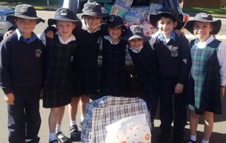 St Michael’s Catholic Primary School Meadowbank students with items donated for families in Lebanon