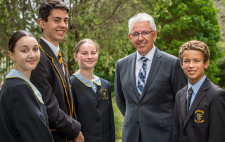 Principal-of-Champagnat-Catholic-College-Pagewood,-Craig-Mooney-and-students