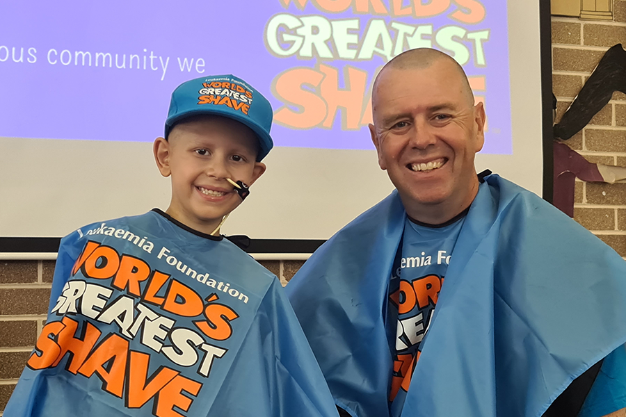 Pictured after his head shave is St Michael's Meadowbank principal Brian Story with Nicholas