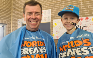 Pictured before his head shave is St Michael's Meadowbank principal Brian Story with Nicholas