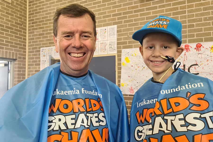 Pictured before his head shave is St Michael's Meadowbank principal Brian Story with Nicholas