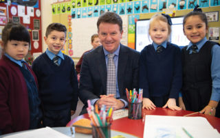 Executive Director Tony Farley with students from Sydney Catholic Schools