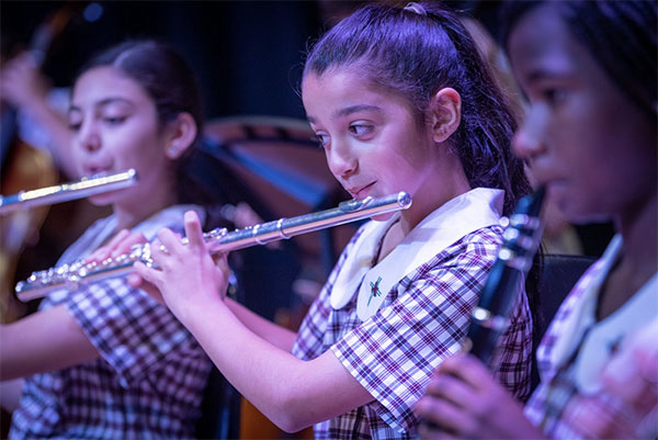 Amadeus-Holy-Spirit-Lakemba students playing musical instruments