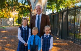 Sydney Catholic Schools' principal Bernard Ryan with students